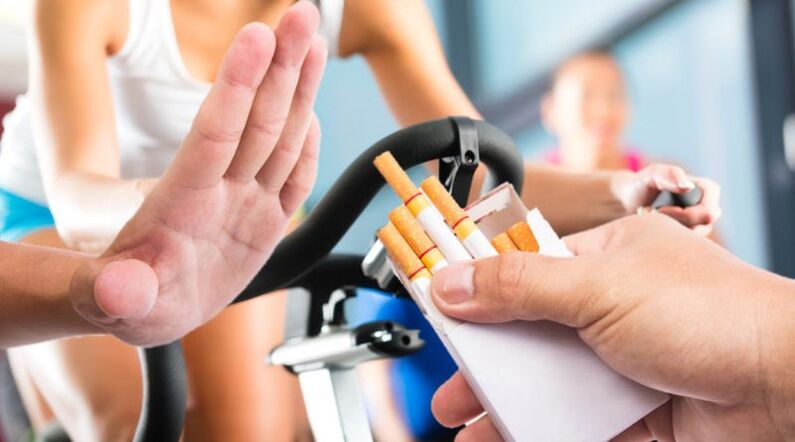 quitting cigarettes and exercising on a stationary bike